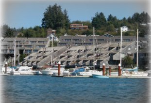 Embarcadero Inn - Suites and townhouses, views, fireplace and kitchens. All rooms have a private deck and view of Yaquina Bay....